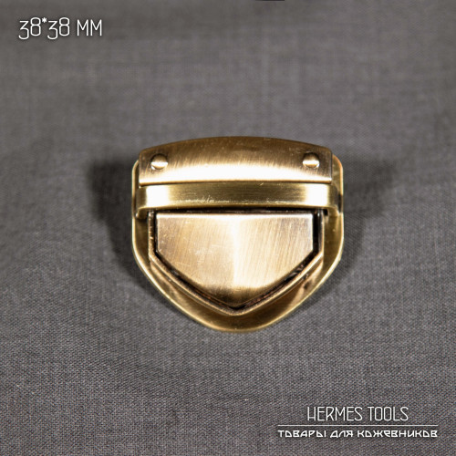 Замок портфельный треугольный. 38 мм. Антик Замок портфельный треугольный. 38 мм. Антик