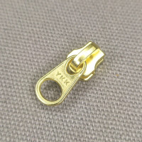 Бегунок YKK латунь №3 Бегунок YKK латунь №3